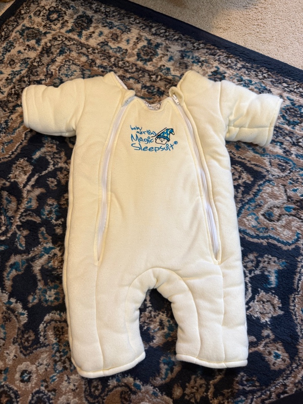 Baby Merlin’s Magic Sleepsuit in Cream